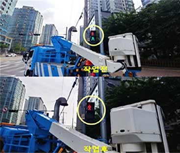고장난 횡단보도 신호등 정비